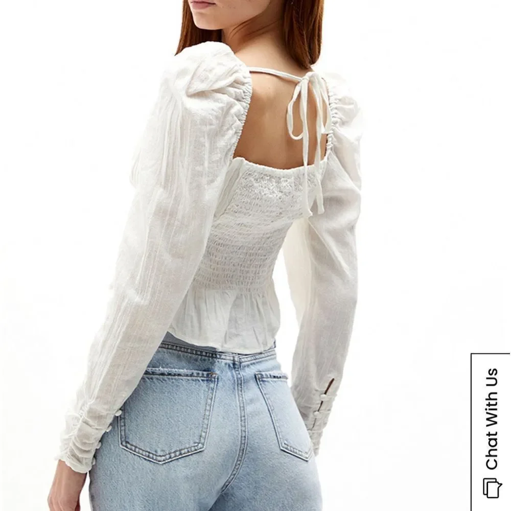 Free People Chloe puff sleeve blouse in white.Size M